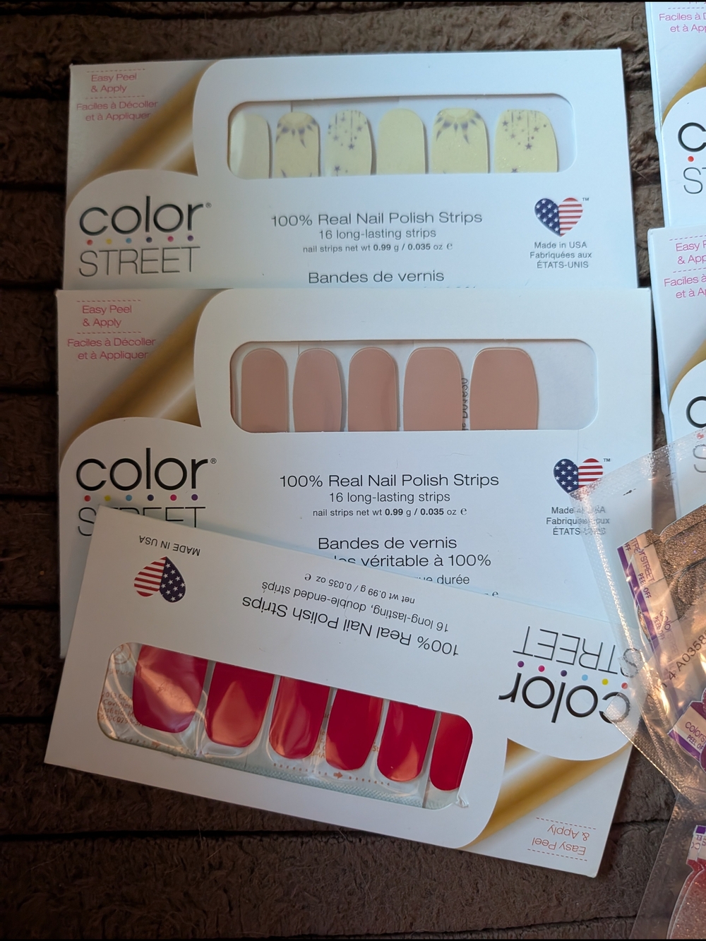 Color Street Nude, Yellow Floral, and Red Press-On Nail Strips by Color Street